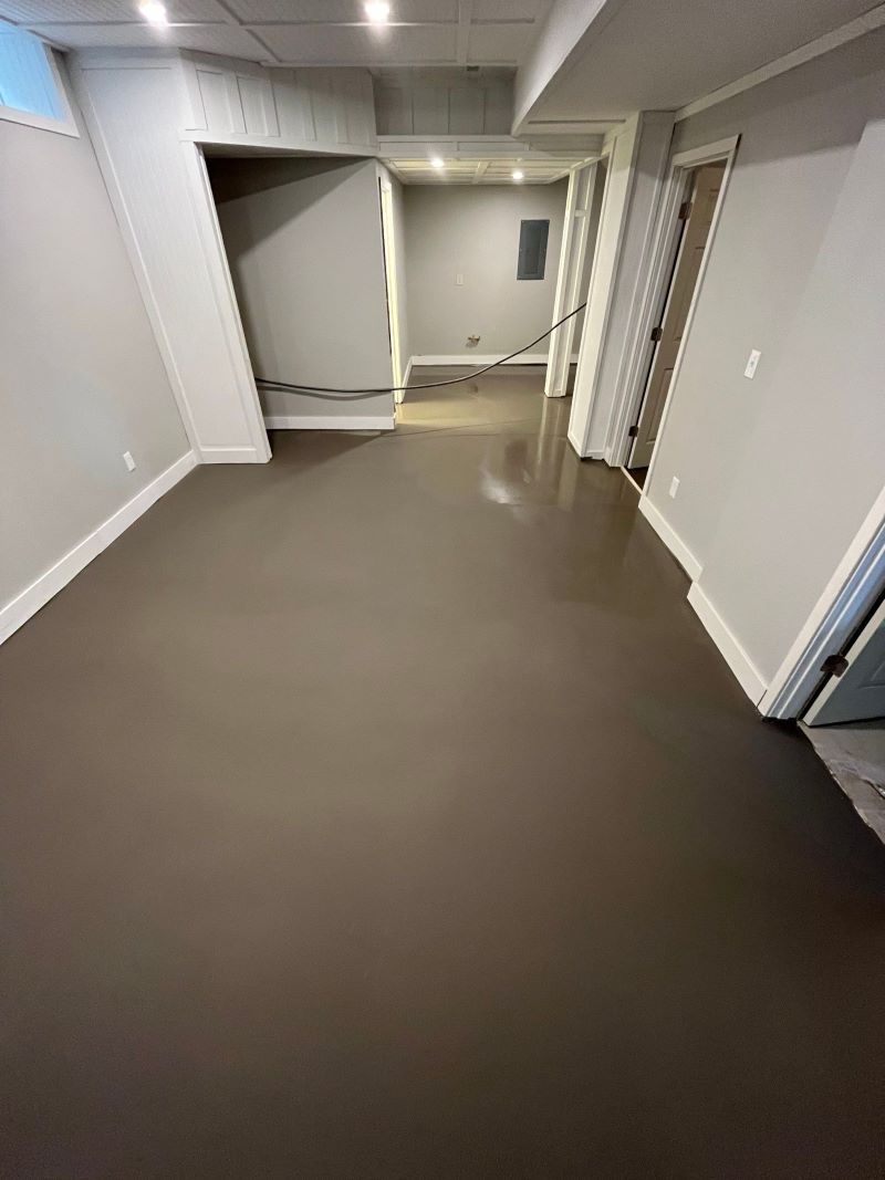 brown epoxy flooring in a basement