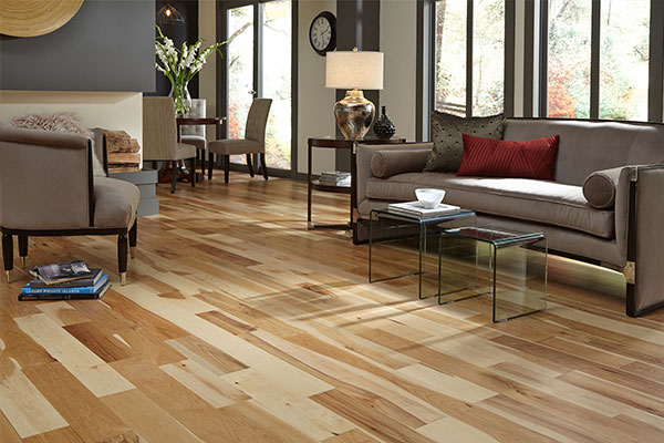 hardwood flooring in a living room with furniture