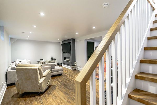 natural hardwood flooring in a basement