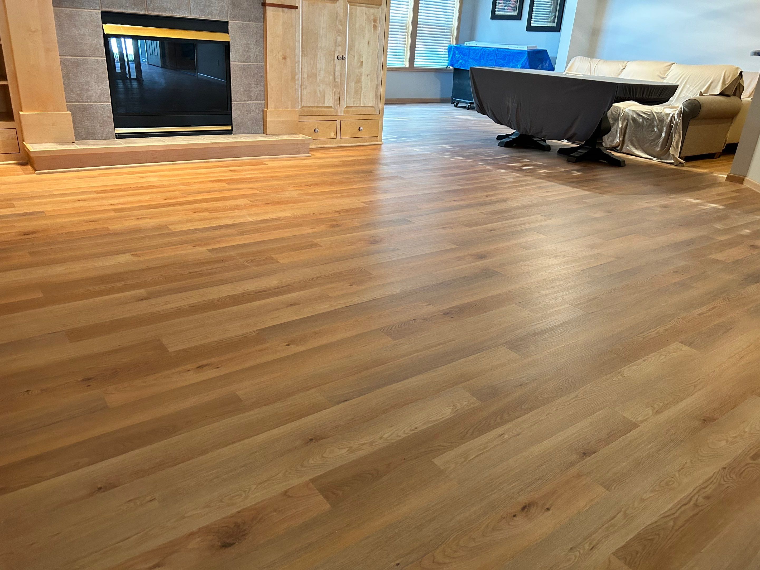 light tan hardwood flooring in a living room